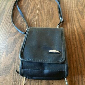 Travel on black Crossbody travel, wallet bag.